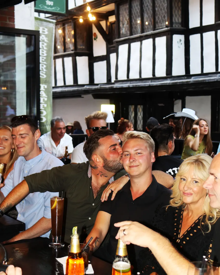 Friends at the bar by the Tudor windows on Butcher Row