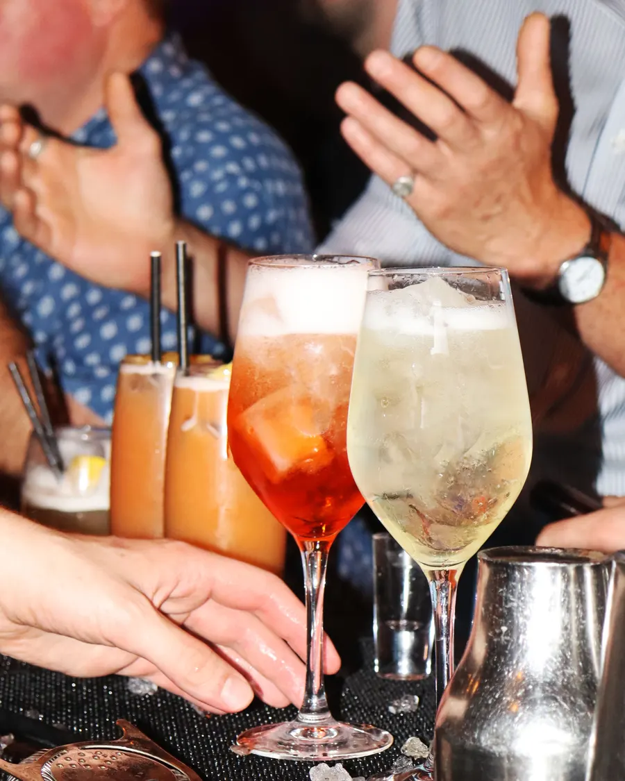 Cocktails raised at the bar